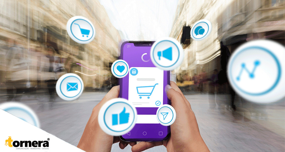 Mãos segurando celular com ícones de redes sociais representando interações digitais