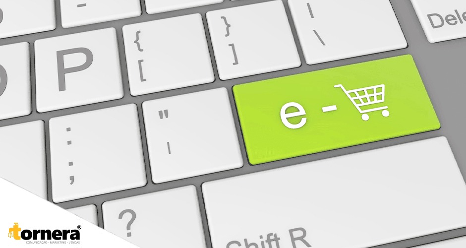 Tecla verde de teclado com ícone de carrinho e texto “e-” simbolizando e-commerce